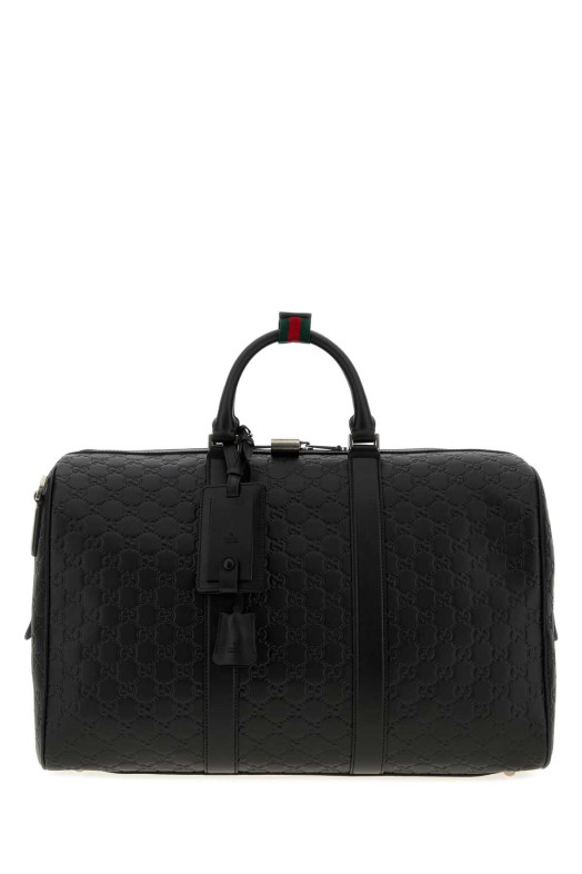 Black leather Emblem travel bag GUCCI (850220AAFOM)