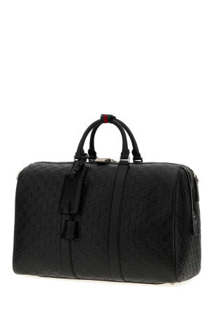 Black leather Emblem travel bag GUCCI (850220AAFOM)