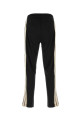 Black tech fabric joggers PALM ANGELS (PAMCJ002FB001)