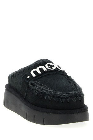'Bounce clog' sabots Black