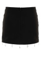 Black stretch gabardine mini skirt DES PHEMMES (D207AQ)