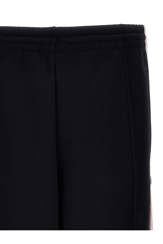 Джоггери з бічними смужками Сині GOLDEN GOOSE (GMP01855P0015265083650836) Джоггери з бічними смужками Сині GOLDEN GOOSE (GMP01855P0015265083650836)