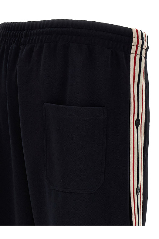 Джоггери з бічними смужками Сині GOLDEN GOOSE (GMP01855P0015265083650836) Джоггери з бічними смужками Сині GOLDEN GOOSE (GMP01855P0015265083650836)