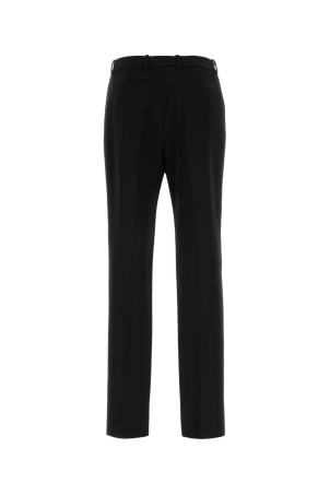 Черные шерстяные брюки Black SAINT LAURENT (751477Y7E63) Черные шерстяные брюки Black SAINT LAURENT (751477Y7E63)