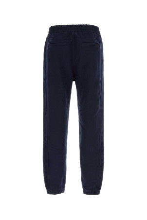 Темно-синие хлопковые джоггеры SAINT LAURENT (778059Y36SW) Темно-синие хлопковые джоггеры SAINT LAURENT (778059Y36SW)