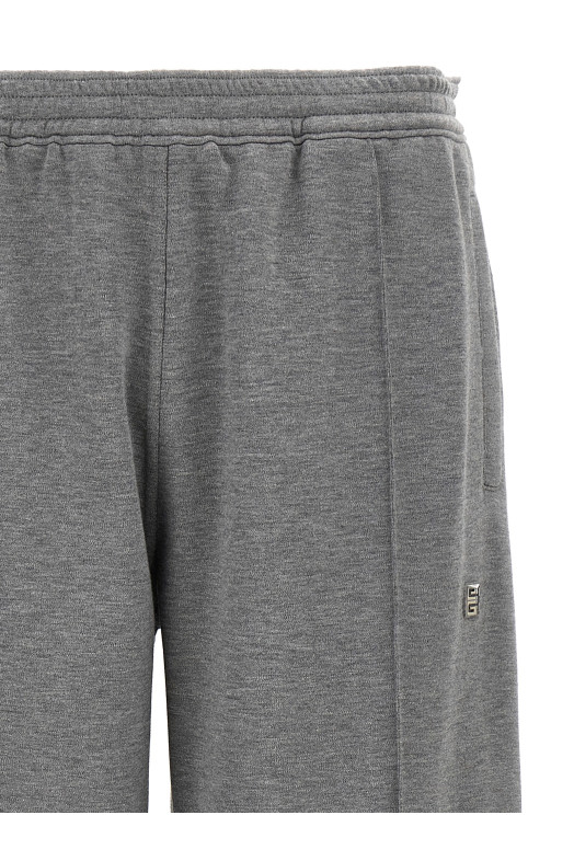Джоггеры с металлическим логотипом Серые GIVENCHY (BM51GQ3YMC050) Джоггеры с металлическим логотипом Серые GIVENCHY (BM51GQ3YMC050)