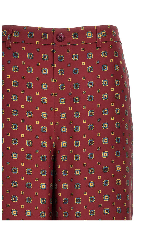 Брюки с узором Бордо MOSCHINO (A030654551139) Брюки с узором Бордо MOSCHINO (A030654551139)