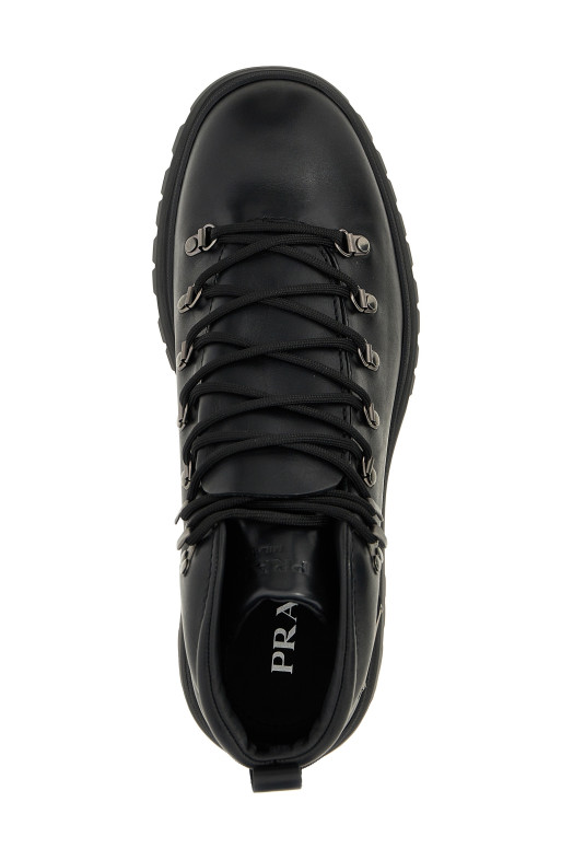 Шкіряні ботильйони з логотипом Чорний PRADA (2TE201FG000070F0002) Шкіряні ботильйони з логотипом Чорний PRADA (2TE201FG000070F0002)